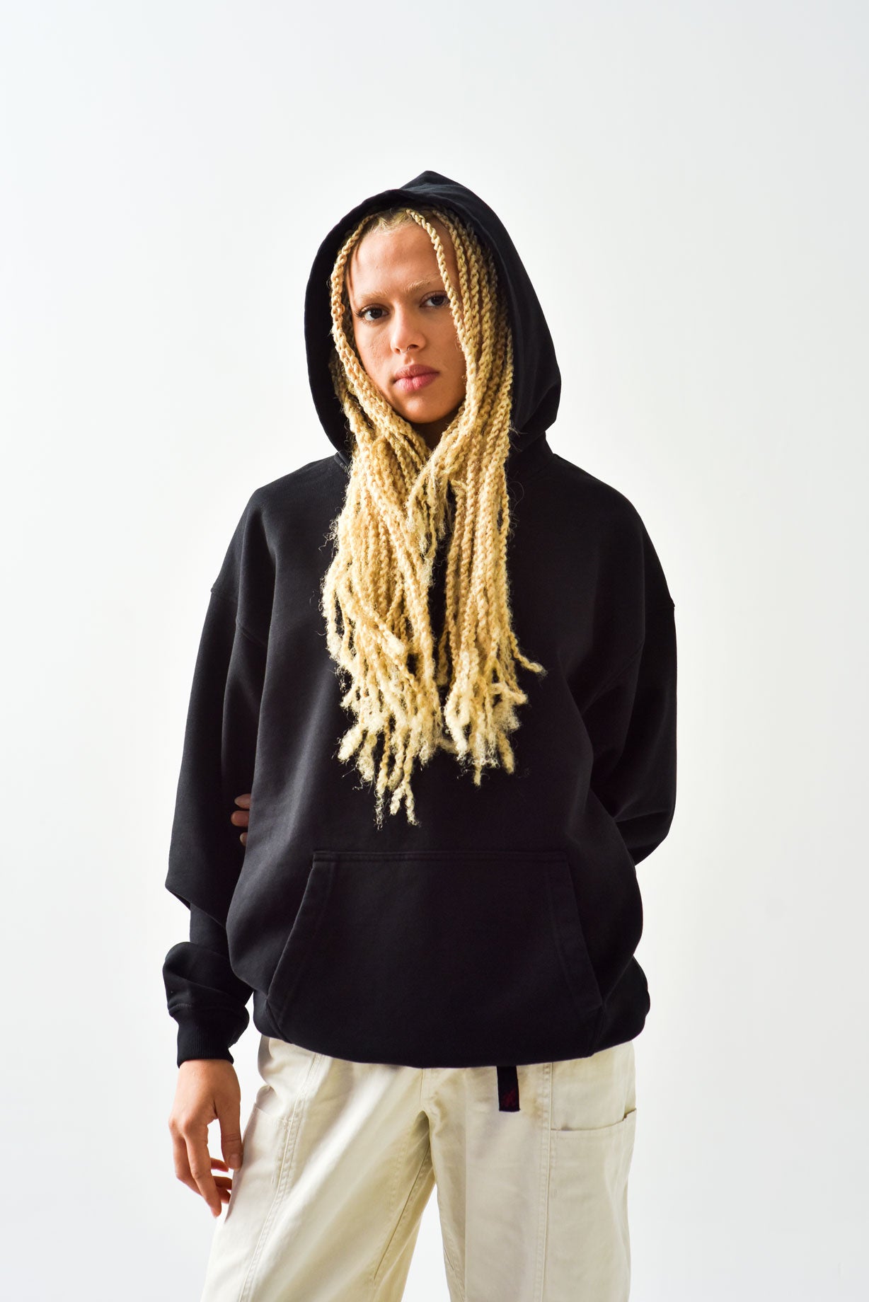 Women in black oversized hoodie